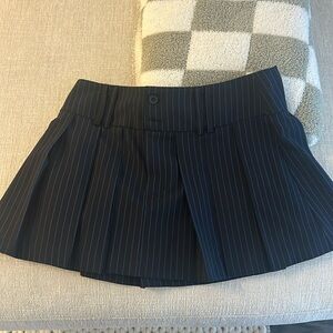 More to come pleated mini skirt